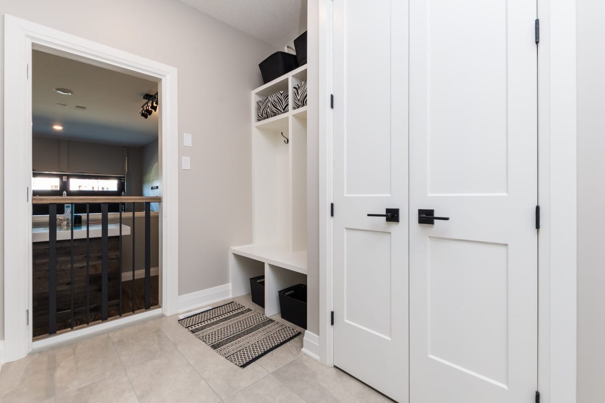 Mud room off of the garage, with built in cubbies and extra closet space.