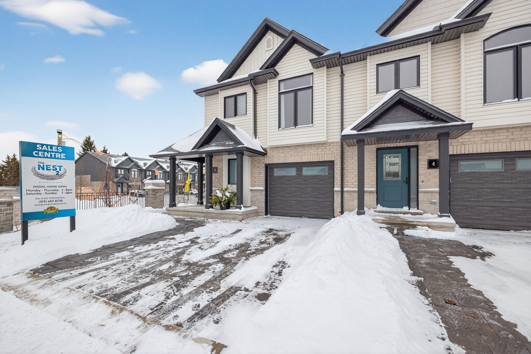 Exterior view The Nest 2 townhomes by Rembrandt Homes.