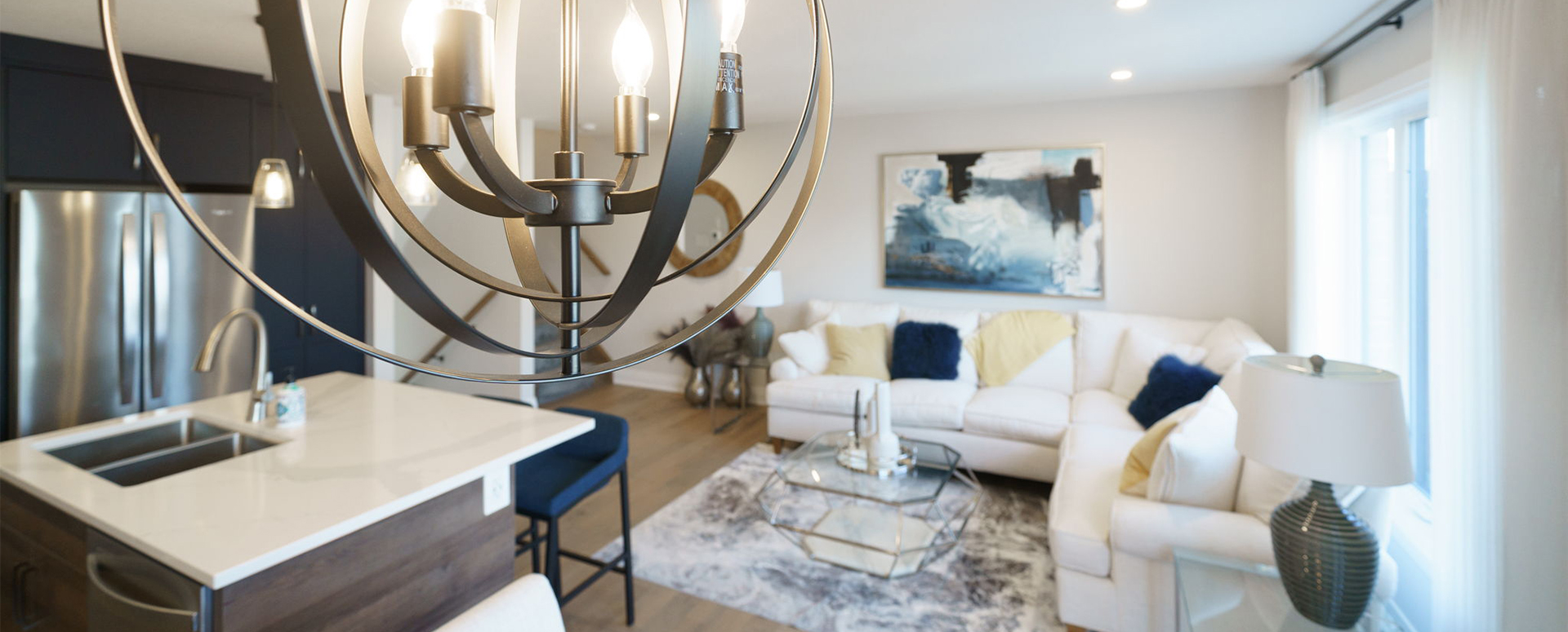 Main floor, with kitchen, dining area, and living room, in a Westerdam model home.